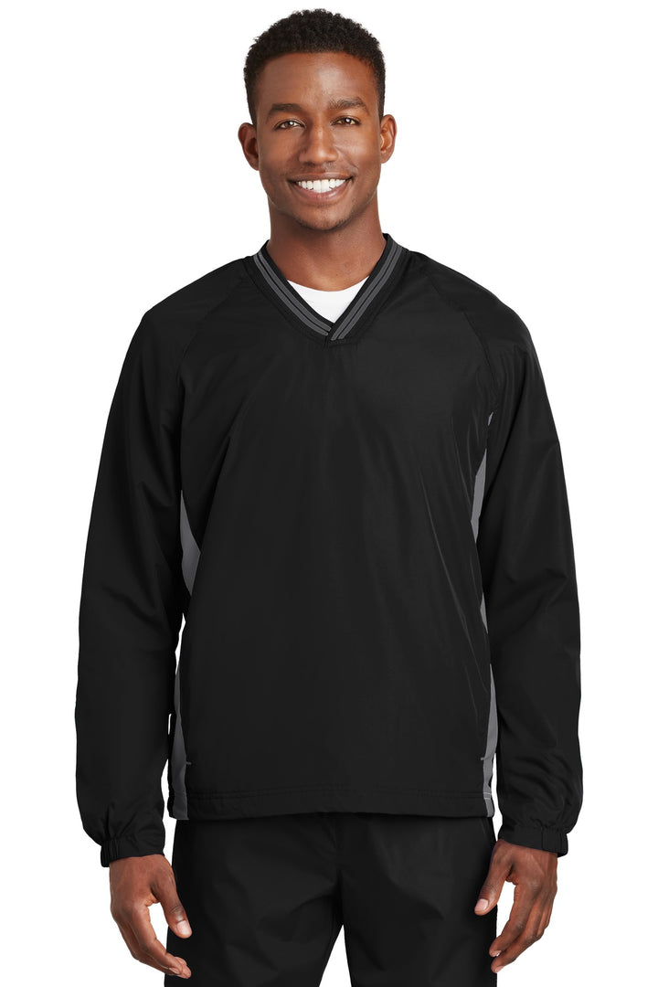 Sport-Tek¨ Tipped V-Neck Raglan Wind Shirt. JST62